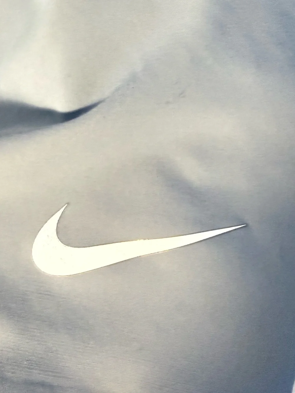 Nike Light Gray Athletic Shorts with Green Side Stripe